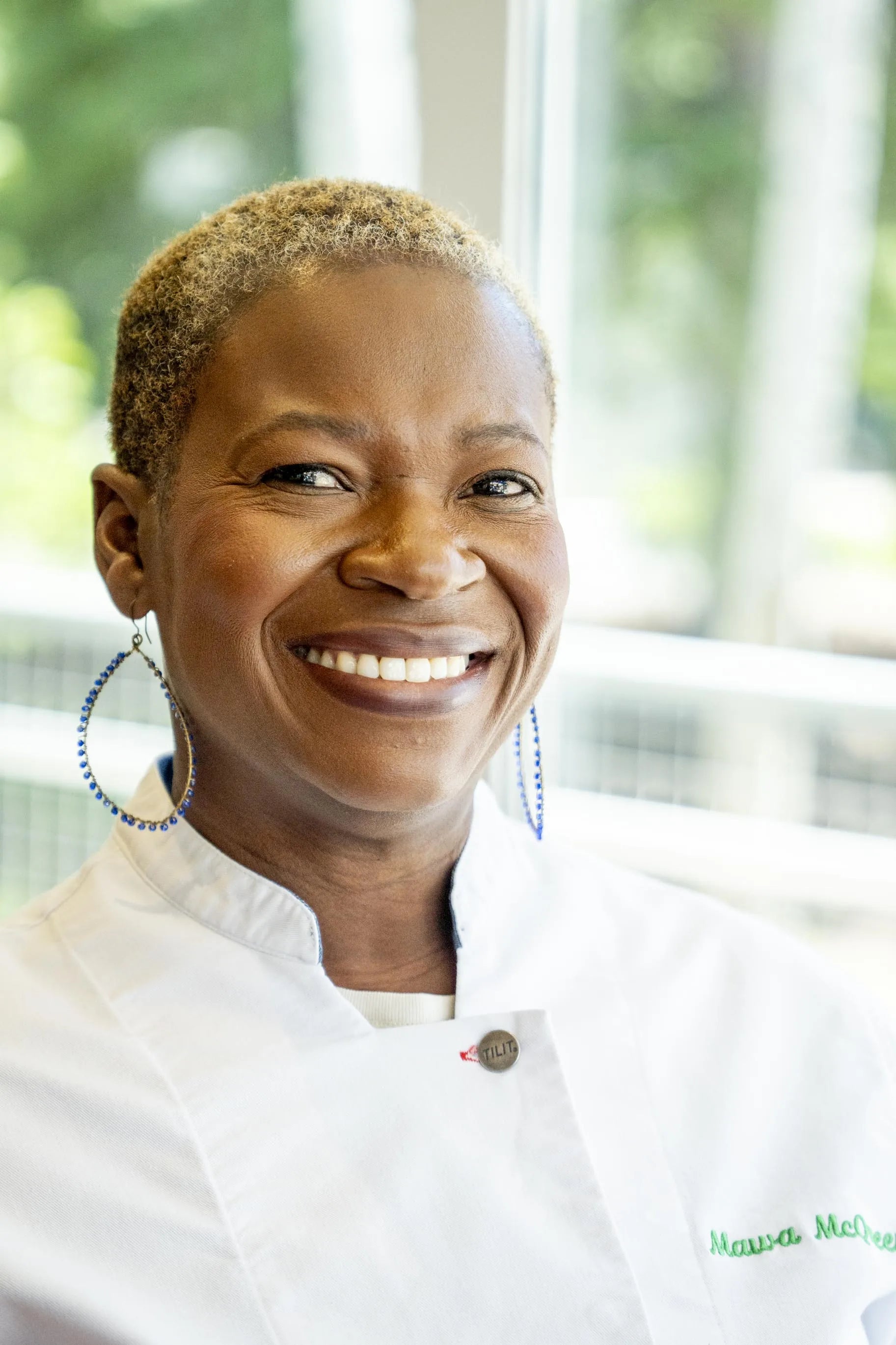 Chef Mawa McQueen in her chef's jacket